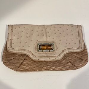 Faux ostrich and basket weave clutch